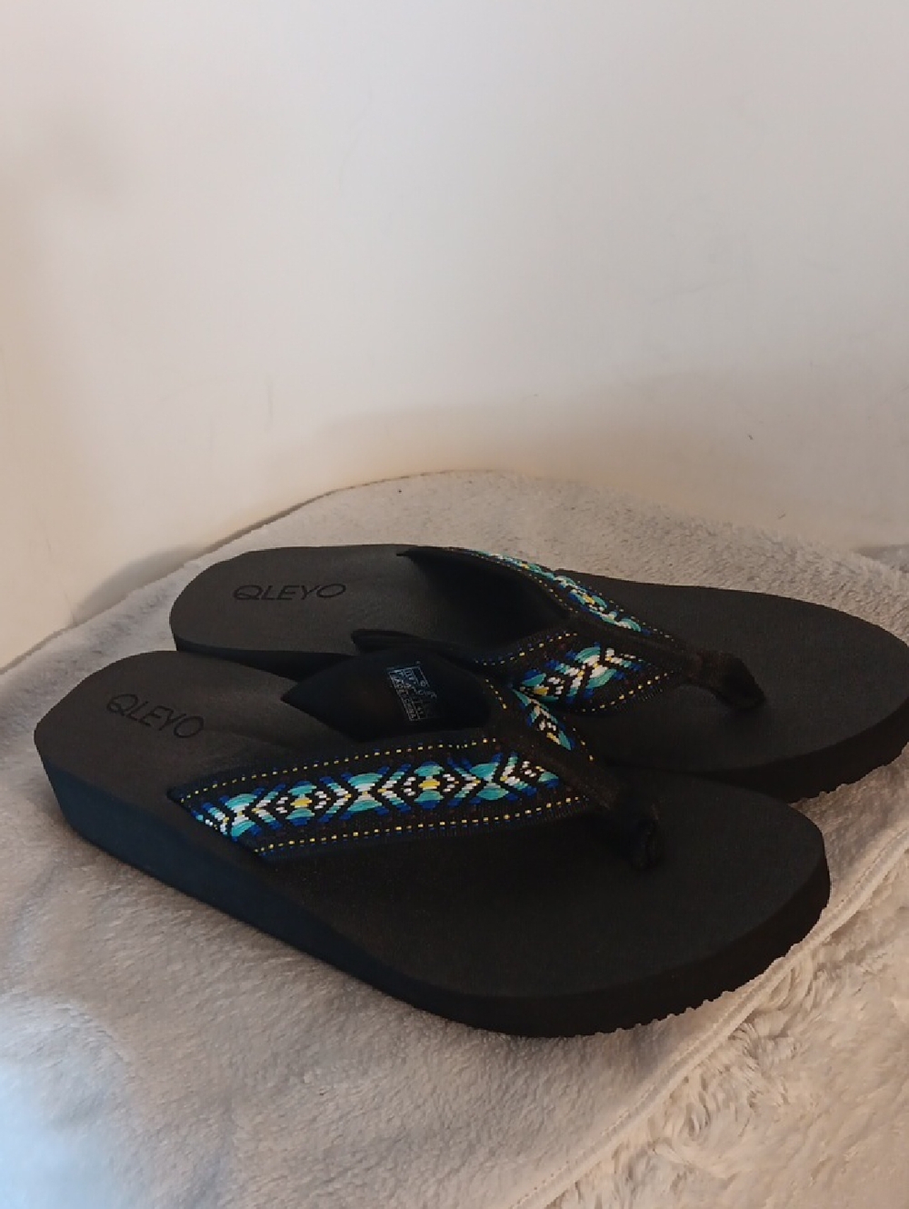 Qleyo Black Flip Flop Sandals with Blue Embroidered Detail
